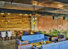 Blue Fabric 4 Piece Sofa Set Under Lighted Hanging Bulbs 974382